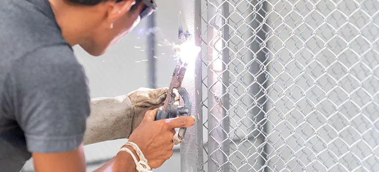 Commercial Mesh Door Repair in Ives Estates, FL